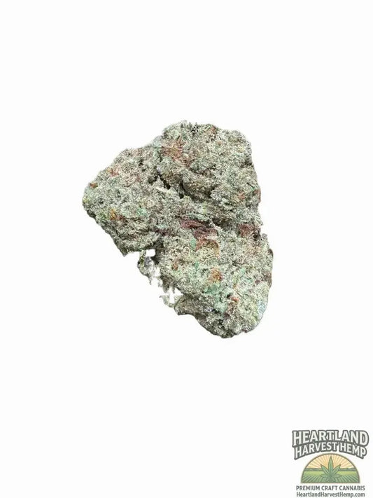 Close-up of cannabis flower bud with dense trichomes and green-orange coloration